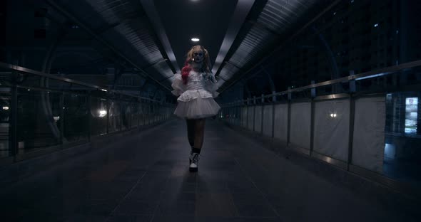 Scary Clown Walking in Overpass Bridge at Night