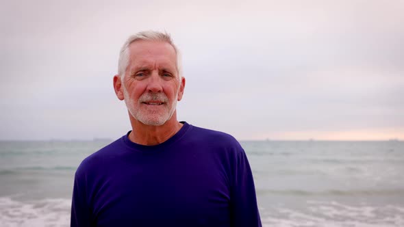 Portrait Of A Mature Man At The Beach