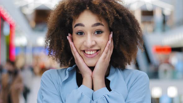 Female Portrait Indoors Closeup Happiness African American Curly Woman Girl Holding Face with Hands