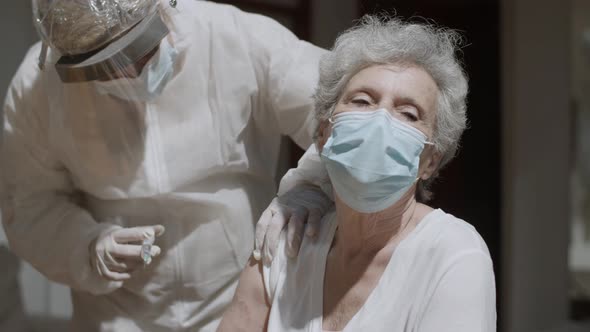 Doctor Video Footage - An Elderly Woman Having Her Vaccine