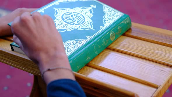 Man Who Thumb Through Quran Mosque