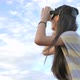 Slow motion 4K of Asian girl having fun with virtual reality glasses while standing over the sky. - VideoHive Item for Sale
