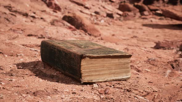 Old Book in Red Rock Desert alt
