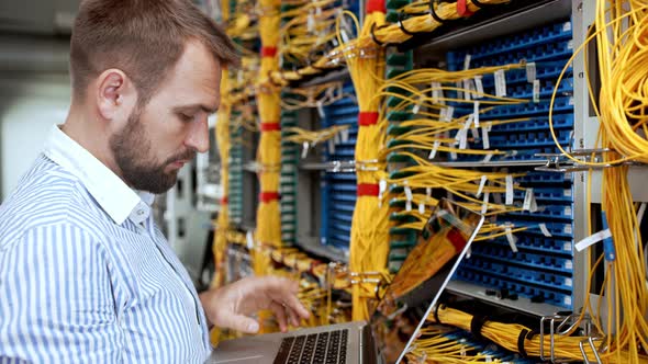 Engineer Working in Data Room