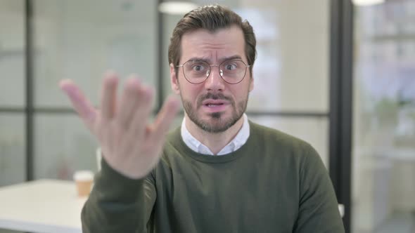 Portrait of Young Businessman Feeling Angry Fighting