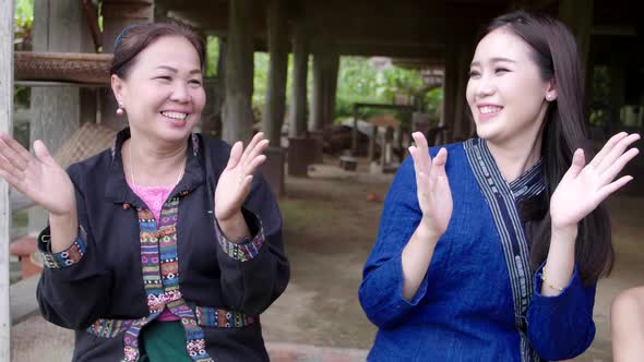 Happy 2 Asian Women Clapping Hands