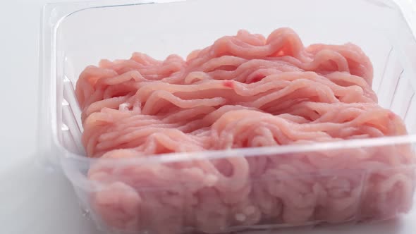 Minced Meat in a Transparent Plastic Container