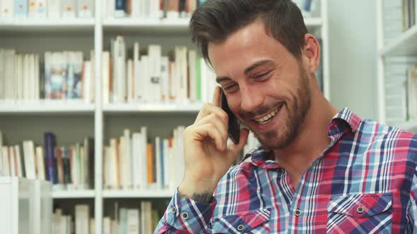 Young Guy Is Talking on the Phone