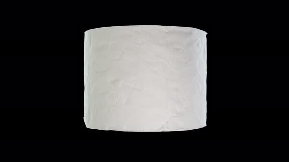 Toilet Paper Rotates on Isolated Black Background
