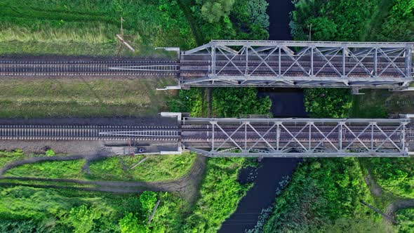 Metal Railway Train Bridge Over the River