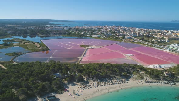 Pink salt ponds near coastal town