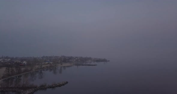 Evening Flight Along The River Bank Of The City