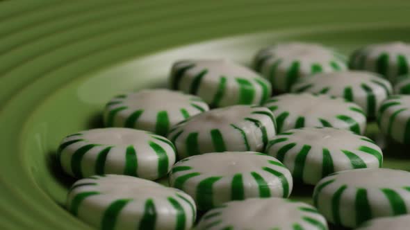 Rotating shot of spearmint hard candies - CANDY SPEARMINT 036