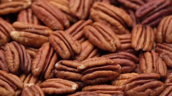 raw pecan nuts close up. Healthy food concept. 4K UHD video