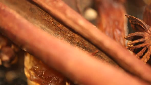 Closeup of Cinnamon Stick and Aniseed Rotating, Sweet and Savoury Food Additive