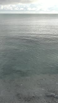 Tanzania  Vertical Video of the Ocean Near the Coast of Zanzibar Slow Motion