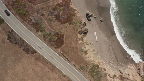 Looking down on Highway 1 and the beach ocean, Going from land to sea, Bodega Bay Northern Californi