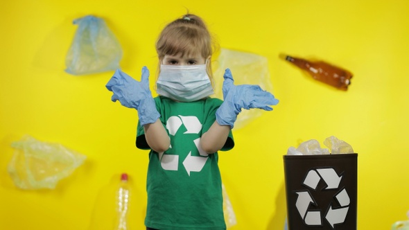 Girl Activist Free Up From Plastic Packages on Her Neck and Head. Plastic Pollution. Save Ecology