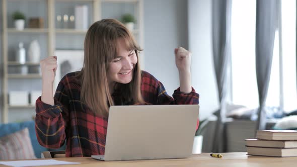 Young Woman Excited for Success in Exams