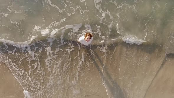 Rapid Footage View From Above of Lovely Happy Girl Enjoying Pleasant Moment Looking Up Giving Air