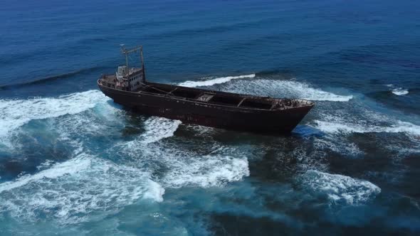 Aerial Drone Footage of Abandoned Ship Shipwreck in Paphos Cyprus Island with Waves