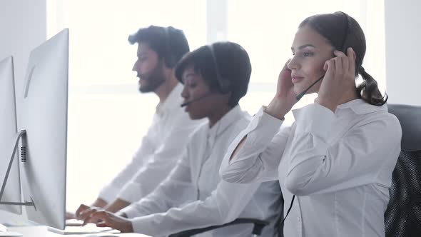 Call Center. Smiling Woman In Headset Working At Computer