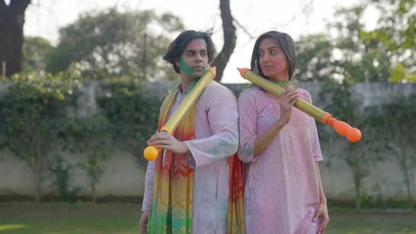 Indian couple posing for Holi
