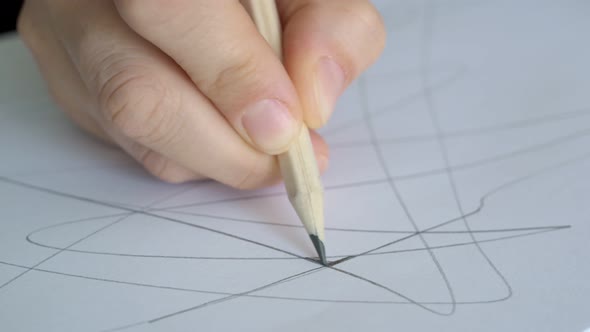 Closeup Hand Draws Lines Sketch