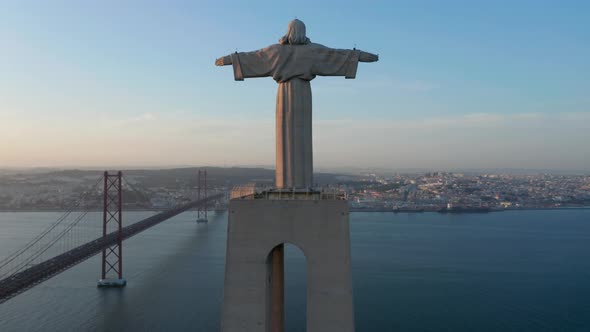 Drone Camera Ascending Along Pedestal and Statue