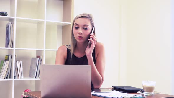 Blonde Business Woman Working at Modern Office