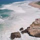 Flight near Rock and Lighthouse near City of Nazare - VideoHive Item for Sale