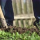 Man in Rubber Boots Dig Garden Bed on a Household Plot - VideoHive Item for Sale