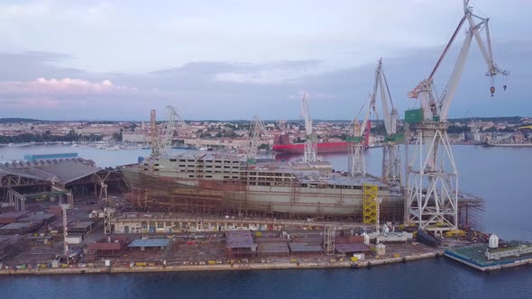 Unfinished Cargo Ship In Shipyard