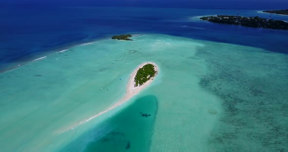 Tropical overhead copy space shot of a white sand paradise beach and turquoise sea background 