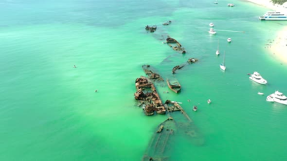 Aerial Flyover of Tangalooma Shipwrecks in Brisbane Australia in the Summer