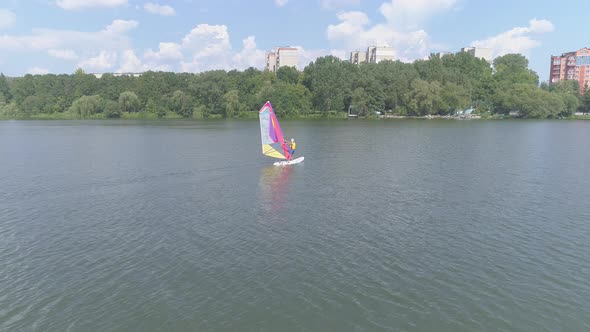 Windsurfer on a lake