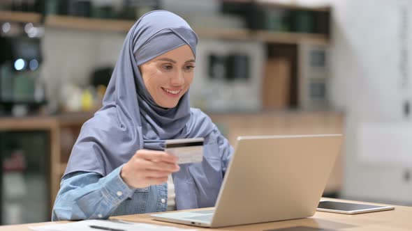 Online Shopping Payment Success on Laptop By Arab Woman 