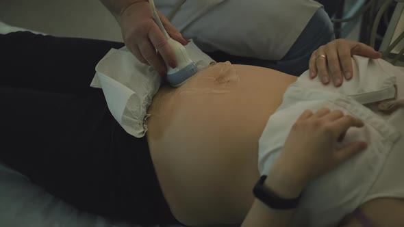 Future Mother Having Ultrasound Examination