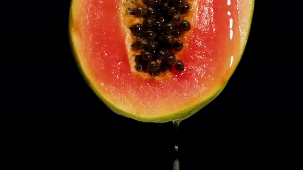 Sweet Papaya Half Isolated on Black Background Chroma Key Fresh Sliced Pawpaw Closeup