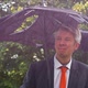 Businessman Sheltering Underneath a Broken Umbrella in the Rain - VideoHive Item for Sale