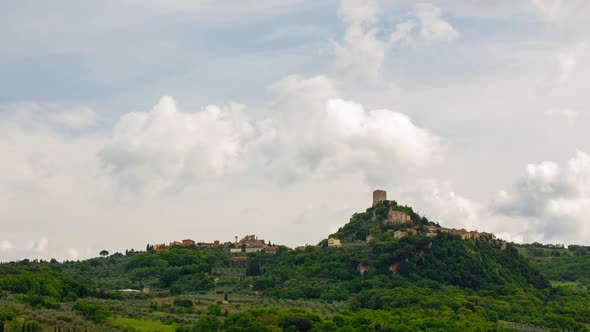 Time lapse of clouds over town of Pienza in Tuscany Italy