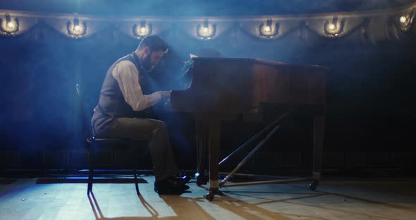 Man Playing Piano on the Stage