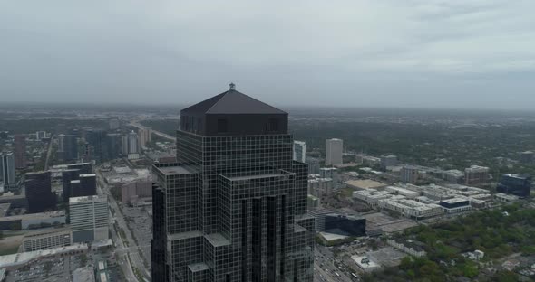 This video is about an aerial view of the Williams Tower and Galleria Mall area in Houston, Texas. T