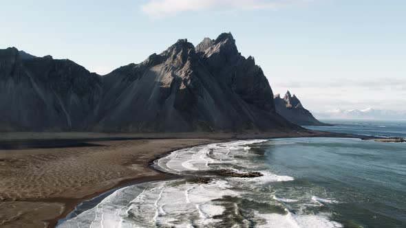 Drone Rising Above Tide And Beach With View Of Vestrahorn