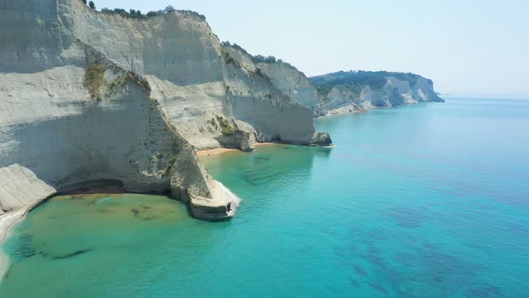 Sheer White Cliffs Of Cape Drastis Near Peroulades