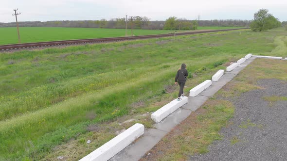 Woman Walking In The Country