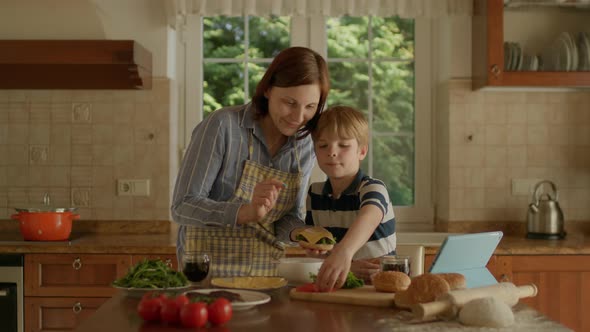 Woman and Kid Making Burgers at Home Together