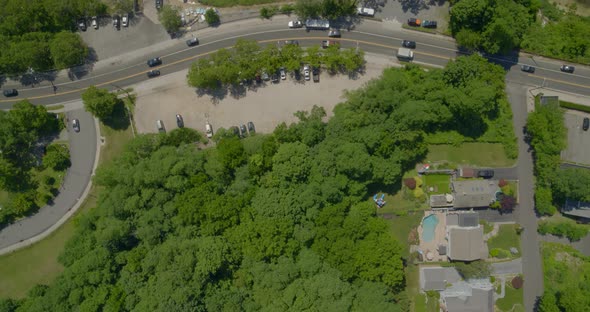 Top Down Aerial Pan of a Town in Long Island and Boats on Cold Spring Harbor