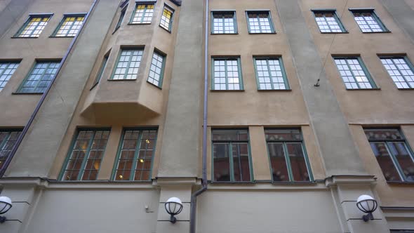 Apartment Buildings on European Streets in Old City. Scandinavian Windows. 