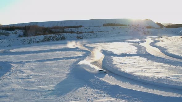 Aerial View of an Ice Rally on a Snowy Track